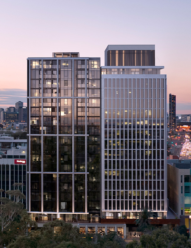 One Fell Swoop - aerial image of The Grace and Melbourne skyline at dusk