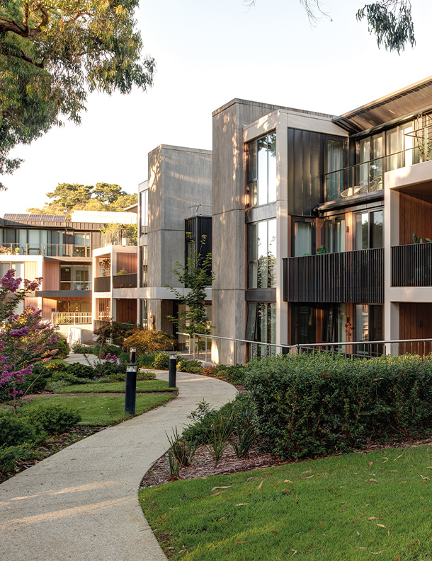 One Fell Swoop – image of Pavilions Blackburn pathway between townhouses