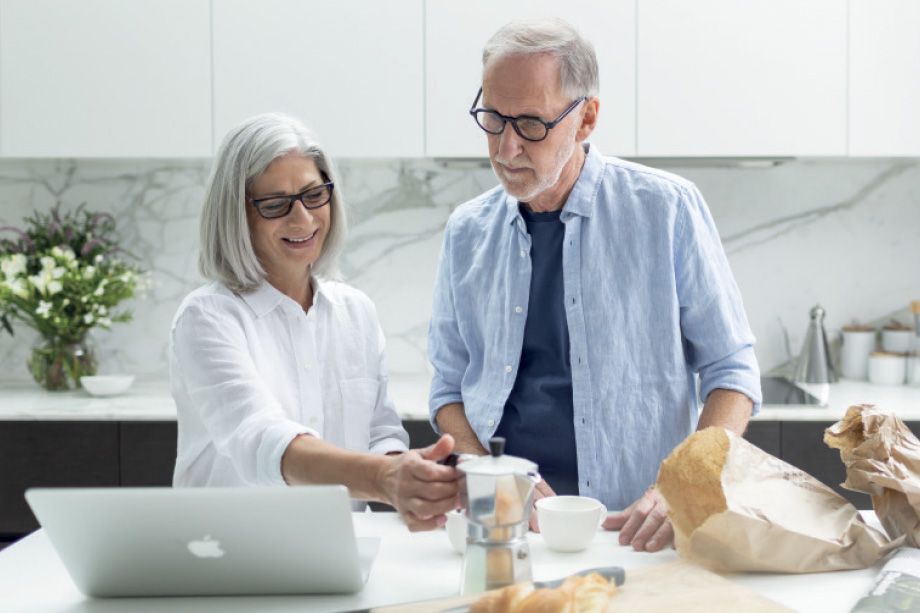 Europa on Alma - couple in apartment kitchen