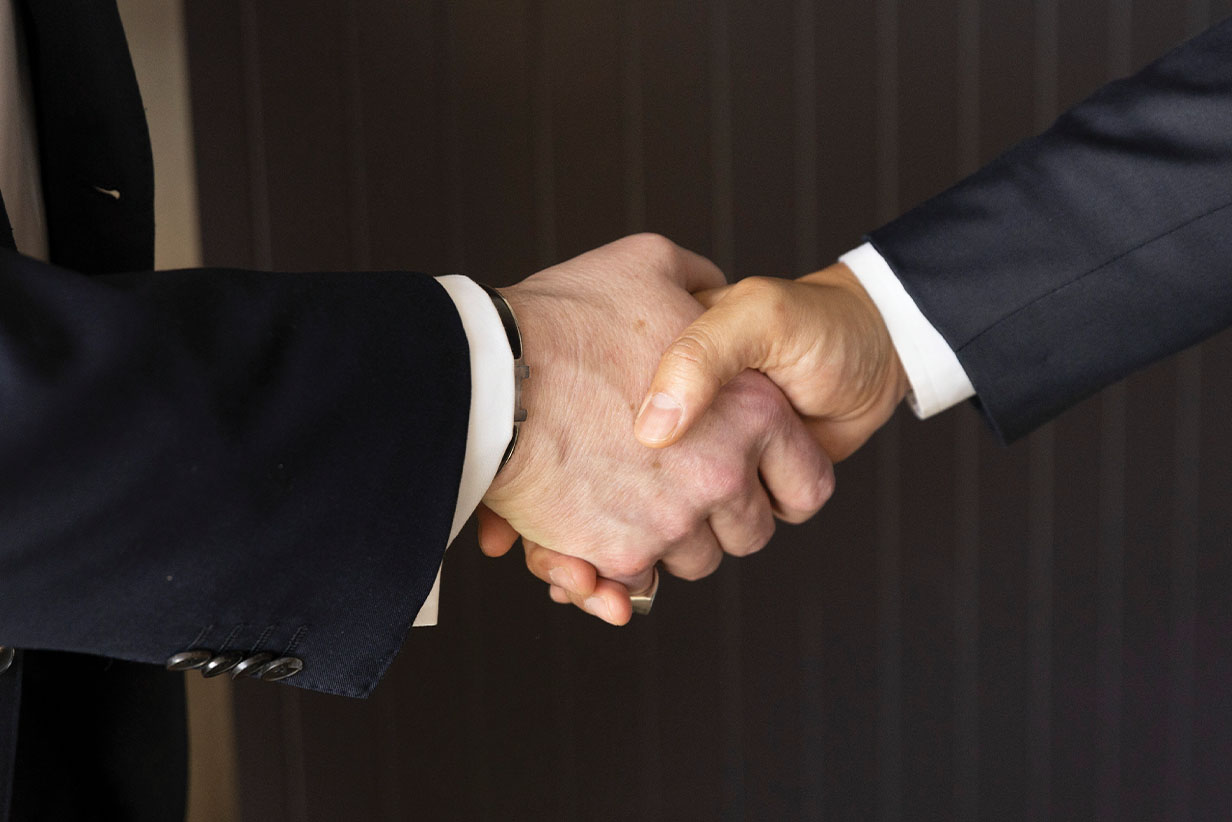 One Fell Swoop - handshake