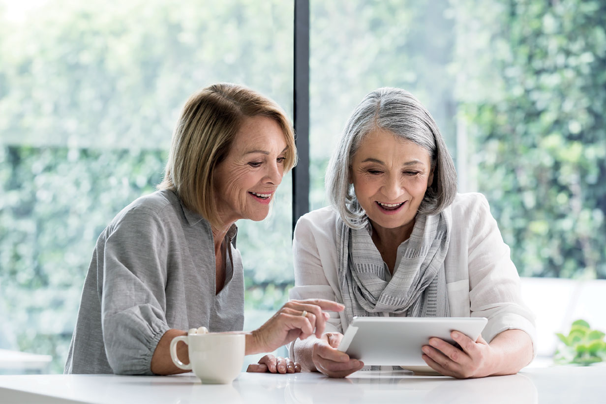 One Fell Swoop - senior woman at tablet