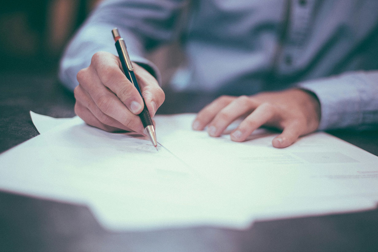 One Fell Swoop - man filling papers