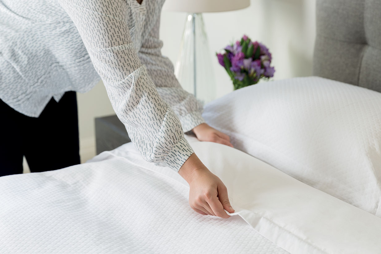 One Fell Swoop - woman making bed