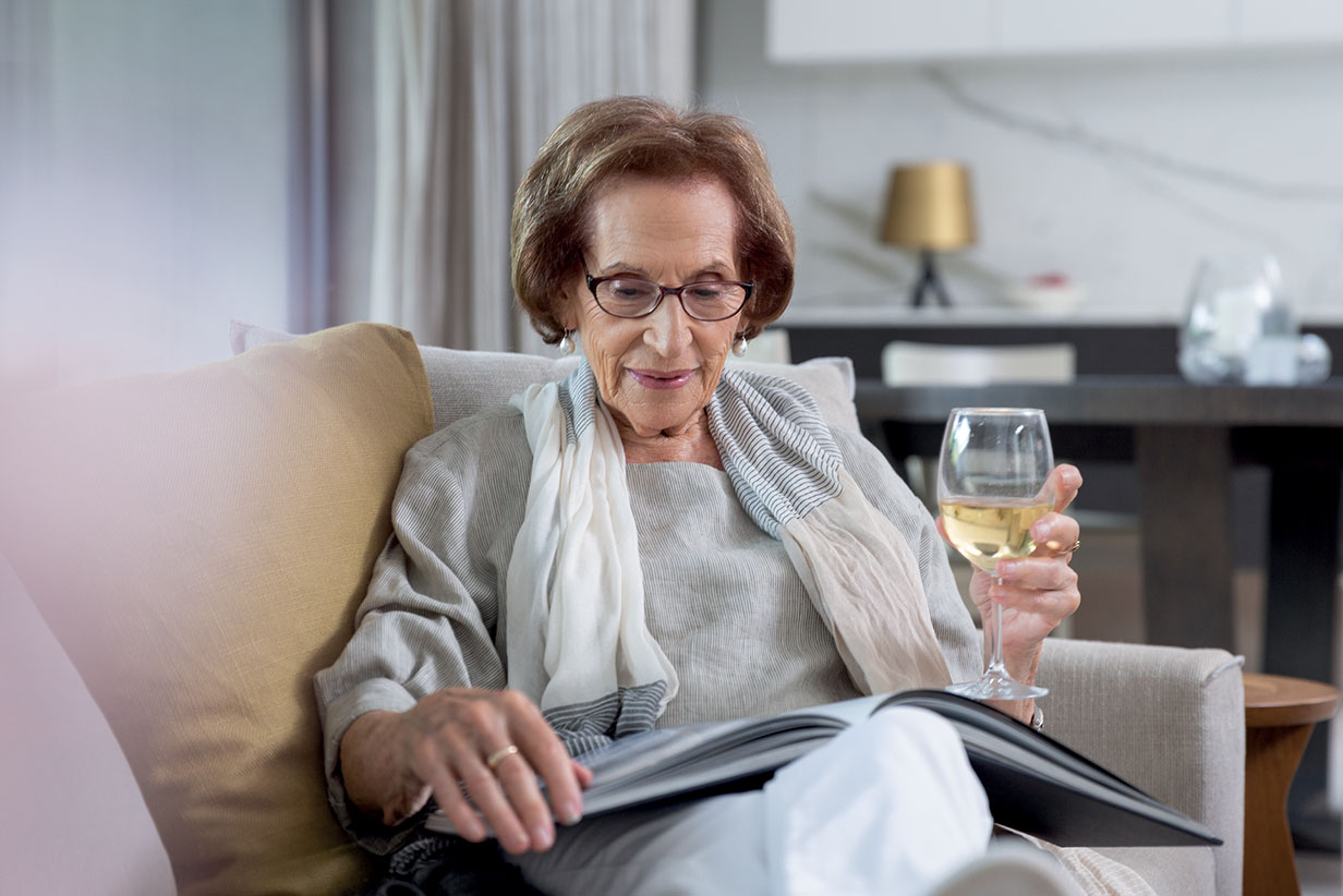 One Fell Swoop - senior woman drinking wine