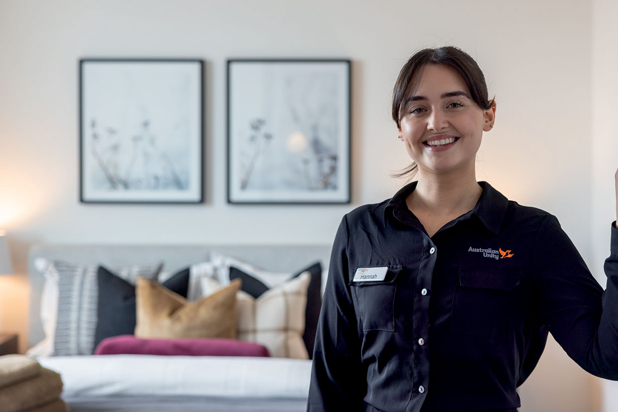 One Fell Swoop - smiling residental worker